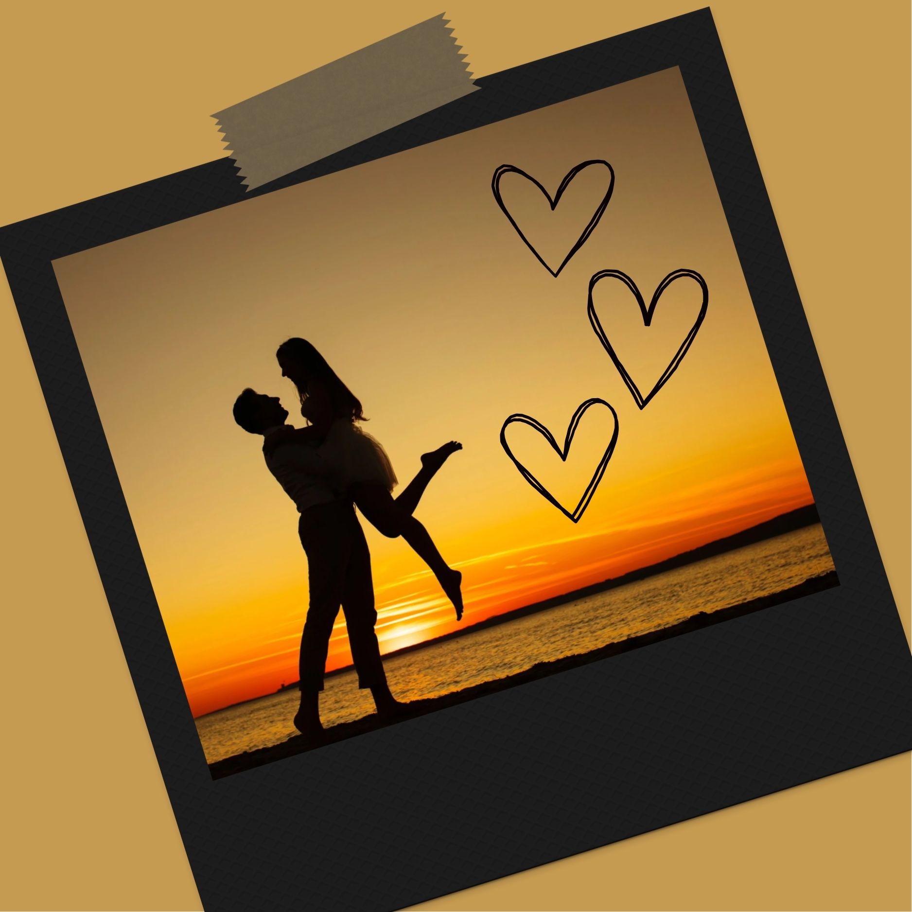 Photograph of a couple dancing on a beach at sunset